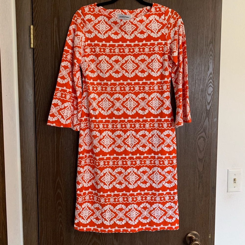 Orange dress with white detail